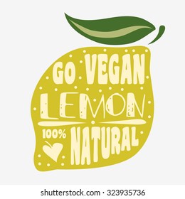 Vegan typographic print with lemon. Go vegan. 100% natural. Can be used as a print on T-shirts and bags, label, restaurant menu and shop of organic food. Hand draw. Inspirational eco poster.