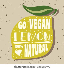 Vegan typographic print with lemon. Go vegan. 100% natural. Can be used as a print on T-shirts and bags, label, restaurant menu and shop of organic food. Hand draw. Inspirational eco poster.
