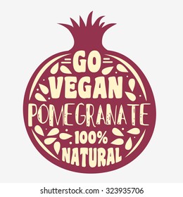 Vegan typographic print with pomegranate. Go vegan. 100% natural. Can be used as a print on T-shirts and bags, label, restaurant menu and shop of organic food. Hand draw. Inspirational eco poster.