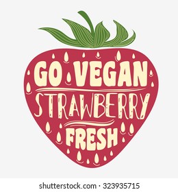Vegan typographic print with strawberry. Go vegan. Fresh. Can be used as a print on T-shirts and bags, label, restaurant menu and shop of organic food. Hand draw. Inspirational eco poster.