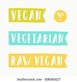 Vegan, vegetarian and raw food signs