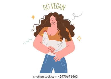 Vegan woman holds chicken with smile and wishes for animals that become victims because of people love for meat. Girl encourages you to be vegan, eating only plant foods and vegetables.