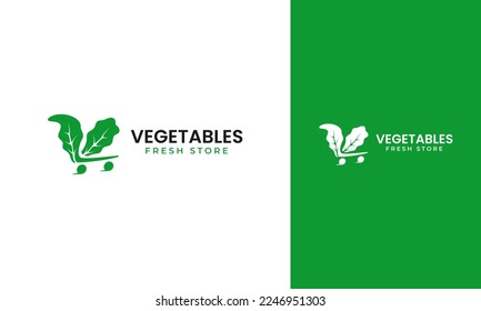 Vegetable fresh store logo design. Trolley symbol with green lettuce concept. Fresh and organic supermarket shop