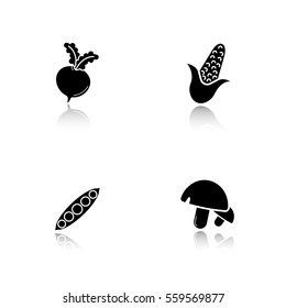 Vegetables drop shadow black icons set. Beet root, open peapod, mushrooms, corn. Isolated vector illustrations