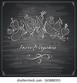 Vegetables and fruits on chalkboard styled background