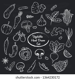 Vegetables hand drawn or doodle set with black and white color on chalk board background