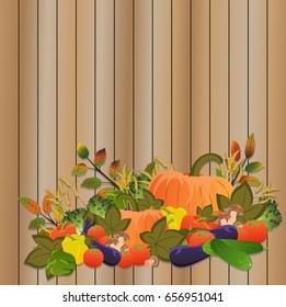 Vegetables on the background of wooden boards. Tomato, cucumber, pumpkin, cabbage, celery, eggplant, bell pepper, mushrooms, ears of wheat or rye, autumn leaves. Autumn harvest. Thanksgiving Day. 