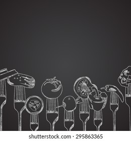 Vegetables on forks drawn on chalkboard