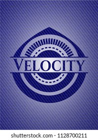 Velocity badge with denim texture