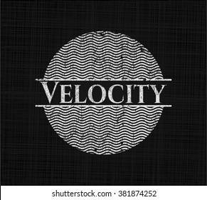 Velocity chalk emblem written on a blackboard