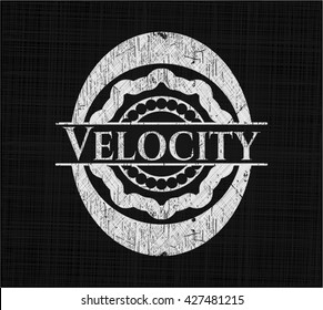 Velocity chalk emblem written on a blackboard