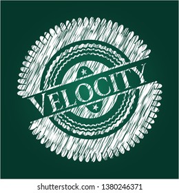 Velocity chalkboard emblem on black board