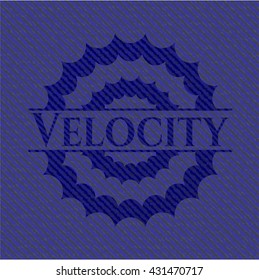 Velocity emblem with jean background