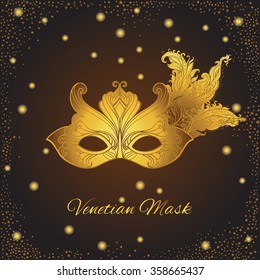 Venetian mask. Carnival face mask in golden colors. Symbol of Venice. Ornate lace mask for theater, carnival or costume party banners and invitations. Hand drawn vector illustration.