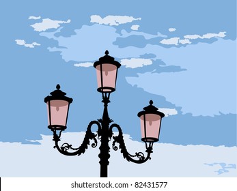 Venetian street lamp against the blue sky