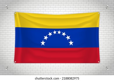 Venezuela flag hanging on brick wall. 3D drawing. Flag attached to the wall. Neatly drawing in groups on separate layers for easy editing.