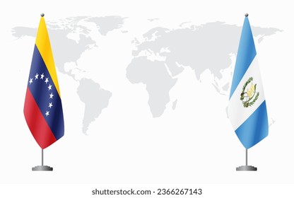 Venezuela and Guatemala flags for official meeting against background of world map.