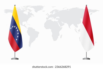 Venezuela and Monaco flags for official meeting against background of world map.