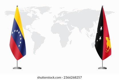 Venezuela and Papua New Guinea flags for official meeting against background of world map.