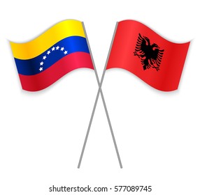 Venezuelan and Albanian crossed flags. Venezuela combined with Albania isolated on white. Language learning, international business or travel concept.