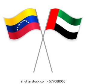 Venezuelan and Emirian crossed flags. Venezuela combined with United Arab Emirates isolated on white. Language learning, international business or travel concept.