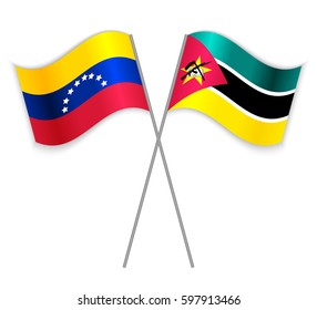 Venezuelan and Mozambican crossed flags. Venezuela combined with Mozambique isolated on white. Language learning, international business or travel concept.