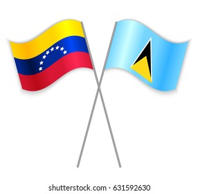Venezuelan and Saint Lucian crossed flags. Venezuela combined with Saint Lucia isolated on white. Language learning, international business or travel concept.