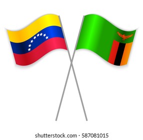 Venezuelan and Zambian crossed flags. Venezuela combined with Zambia isolated on white. Language learning, international business or travel concept.
