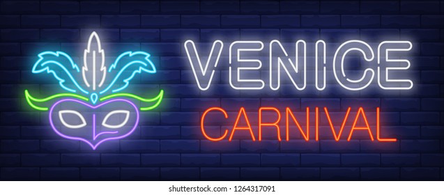 Venice carnival neon sign. Glowing inscription with bright mask and feathers on brick wall background. Vector illustration can be used for entertainment, masquerade, fun, carnival