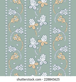 Vertical floral wallpaper. Vertical border with abstract flowers. Vintage floral background. Seamless pattern.