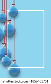 Vertical frame with bluechristmas tree balls hanging on red ribbons. Space for text. Vector holiday illustration.