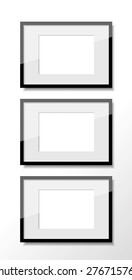 Vertical group of three photo frames.