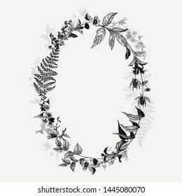 Vertical hand drawn elliptical frame with wild flowers and herbs. Black and white arrangement in vintage style.