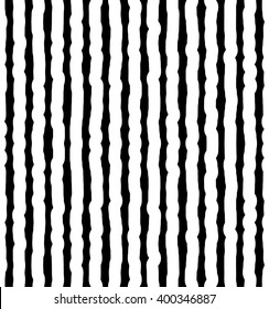 Vertical irregular, hand drawn, sketchy lines. Repeatable pattern. abstract monochrome background.