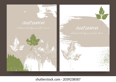 Vertical layouts with an autumn design of natural shades in the grunge style. A mock-up with splashes,spots and a colorful silhouette of autumn leaves. Abstract background for your text.