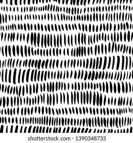 Vertical paint dry lines ink seamless pattern. Abstract hand drawn brush texture, geometric pattern. Short grunge brushstrokes. Black  background design. Wallpaper vector fill, textile design.