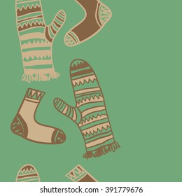 Vertical pattern of mittens,socks, doodles, hole, zigzag, seamless ,fringe, copy space. Hand drawn.