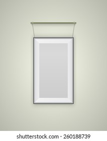 Vertical picture frame with shadow hanging on batten. Vector illustration
