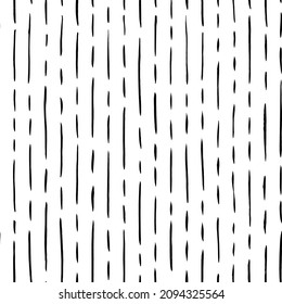 Vertical short and long lines hand drawn seamless pattern. Black and white simple vector pattern with abstract thin dashes and lines. Horizontal dotted stripes. Grunge dash stains background