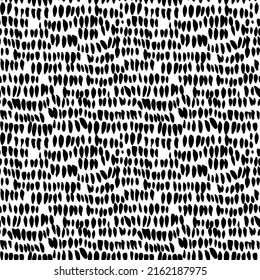 Vertical small dots in a row. Hand drawn geometric vector seamless pattern. Abstract monochrome background with uneven specks, spots, ink blobs. Background with irregular, chaotic dots, points