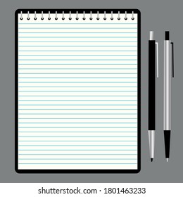 Vertical spiral block with blank lined sheets on a black board. With two pens placed next to each other.