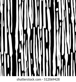 Vertical stripes with a brush. Seamless monochrome vector pattern.A template for a print fabric, wrapping paper, textiles.