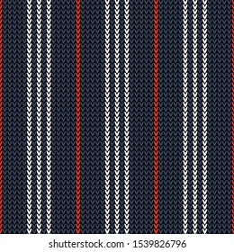Vertical stripes seamless pattern with knitted texture. White and red vertical lines on dark blue background. Texture for everyday casual top, scarf, bag, trousers, or other modern textile print.