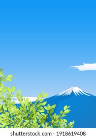 paisaje verticalmente largo del monte Fuji y hojas verdes frescas