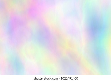 Very beautiful iridescent paper. Holographic Foil. Wonderful magic background. Colorful wallpaper. Rainbow abstract sky. Trendy art