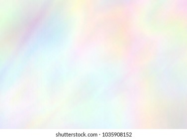Very beautiful rainbow texture. Holographic Foil. Wonderful magic background. Colorful wallpaper. Iridescent card. Trendy art