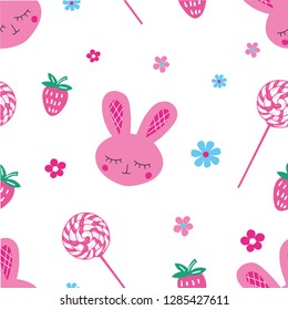 A very cute baby pattern with a pink rabbit, candy, flowers and strawberries