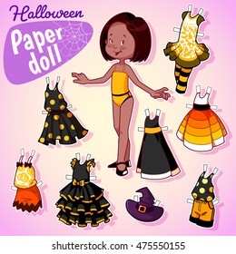 Very cute paper doll with seven beautiful dresses at halloween. Brunette girl.