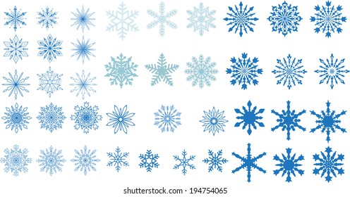 A very large set of various carved, lace or simple snowflakes