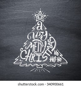 Very Merry Christmas typographic label with greetings on black chalkboard. Vector illustration with hand lettering in doodle christmas tree shape